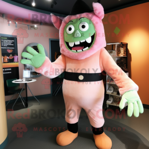 Peach Frankenstein'S Monster mascot costume character dressed with a Jeggings and Mittens