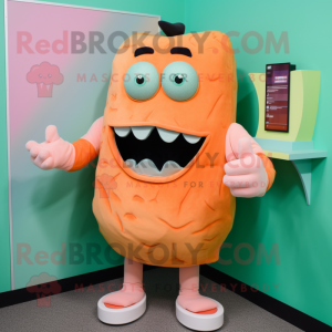 Peach Frankenstein'S Monster mascot costume character dressed with a Jeggings and Mittens