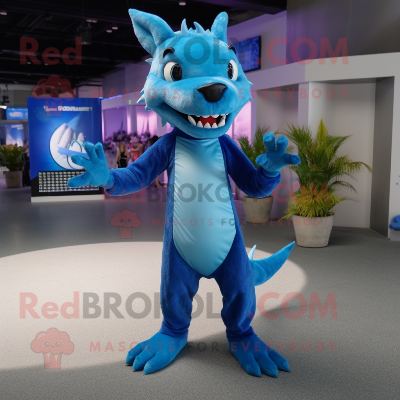 Blue Chupacabra mascot costume character dressed with a Tank Top and Shoe clips Blue Chupacabra mascot costume character dressed with a Tank Top and Shoe clips