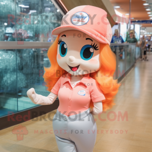 Peach Mermaid mascot costume character dressed with a Polo Shirt and Caps