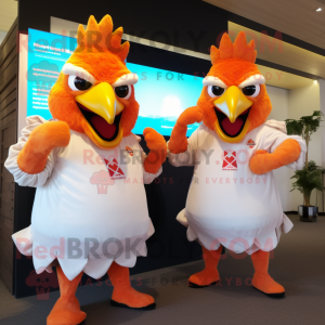 Peach Roosters mascot costume character dressed with a Jumpsuit and Wraps