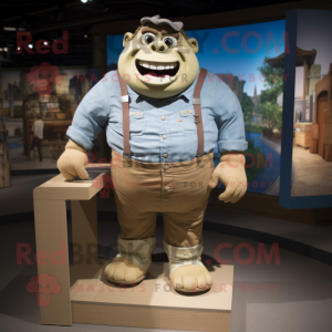 Tan Ogre mascot costume character dressed with a Chambray Shirt and Ties