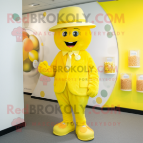 Yellow Candy mascot costume character dressed with a Playsuit and Hats