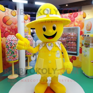 Yellow Candy mascot costume character dressed with a Playsuit and Hats