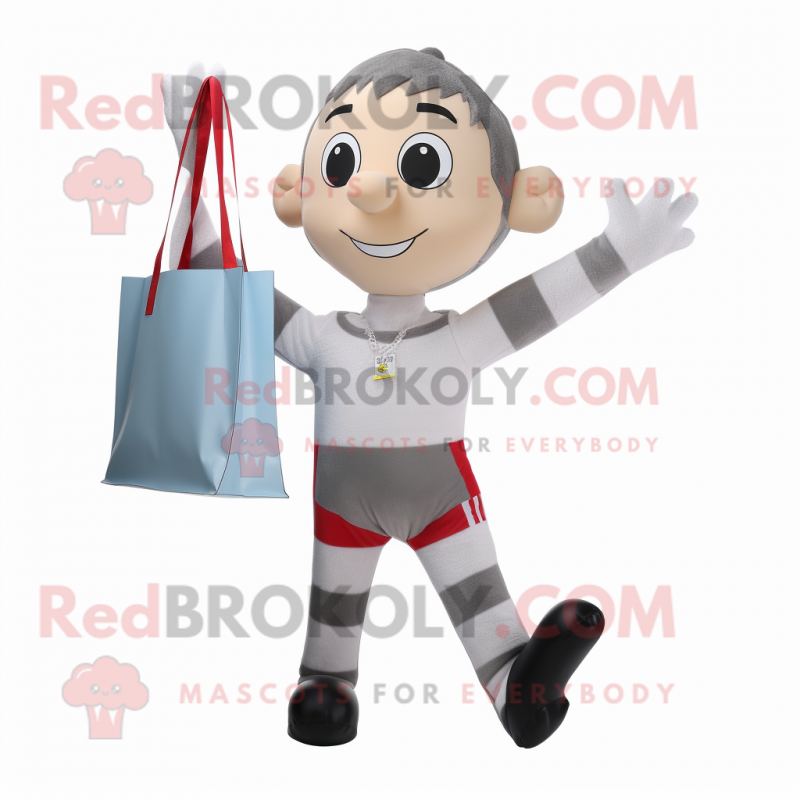 Silver Trapeze Artist mascot costume character dressed with a Rugby Shirt and Tote bags