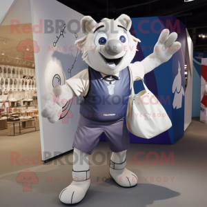 Silver Trapeze Artist mascot costume character dressed with a Rugby Shirt and Tote bags
