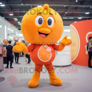 Orange Candy mascot costume character dressed with a Romper and Rings