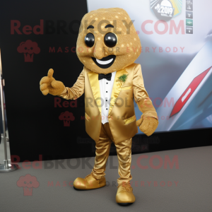 Gold Falafel mascot costume character dressed with a Blazer and Shoe clips