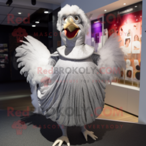 Silver Hens mascot costume character dressed with a Wrap Skirt and Shawl pins