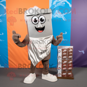 Silver Chocolate Bar mascot costume character dressed with a Board Shorts and Scarves