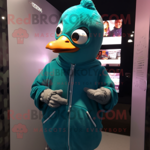 Teal Pigeon mascot costume character dressed with a Hoodie and Brooches