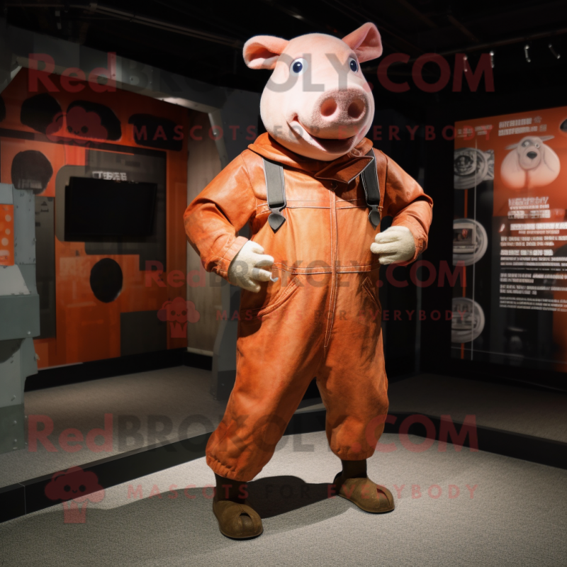 Rust Pig mascot costume character dressed with a Jumpsuit and Handbags Rust Pig mascot costume character dressed with a Jumpsuit and Handbags