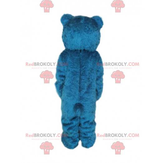 Mascote urso azul com olhos negros - Redbrokoly.com