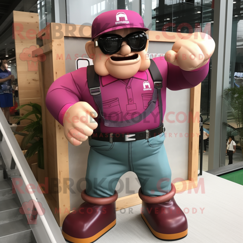Magenta Strongman mascot costume character dressed with a Cargo Shorts and Eyeglasses Magenta Strongman mascot costume character dressed with a Cargo Shorts and Eyeglasses