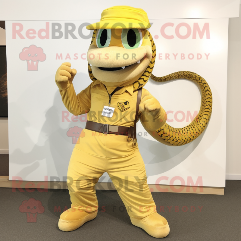 Gold Snake mascot costume character dressed with a Dungarees and Belts