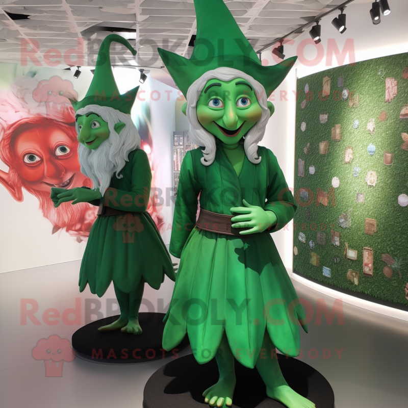Green Elf mascot costume character dressed with a Maxi Dress and Cufflinks