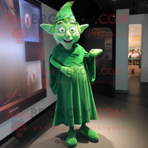 Green Elf mascot costume character dressed with a Maxi Dress and Cufflinks