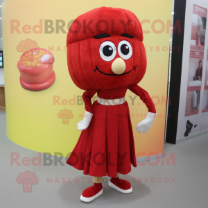 Red Falafel mascot costume character dressed with a Pencil Skirt and Shoe laces