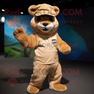 Cream Jaguarundi mascot costume character dressed with a Romper and Caps