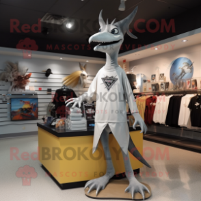 Silver Pterodactyl mascot costume character dressed with a Graphic Tee and Shoe clips