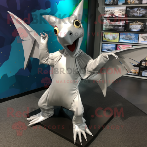 Silver Pterodactyl mascot costume character dressed with a Graphic Tee and Shoe clips