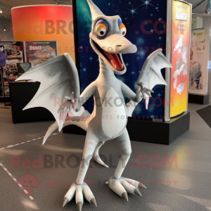 Silver Pterodactyl mascot costume character dressed with a Graphic Tee and Shoe clips