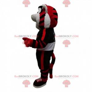 Mascotte de tigre rouge et noir avec une tenue de sport -