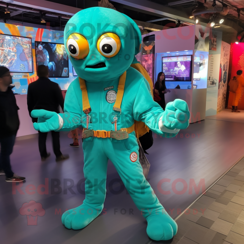 Turquoise Kraken mascot costume character dressed with a Jumpsuit and Smartwatches