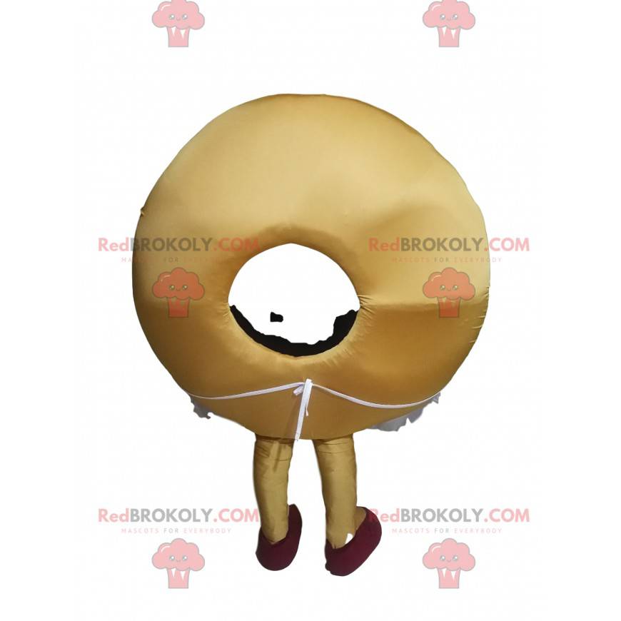 Mascotte de donut avec beau sourire et un tablier -