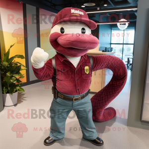 Maroon Anaconda mascot costume character dressed with a Jeans and Berets
