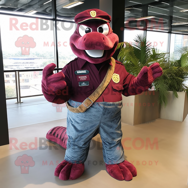 Maroon Anaconda mascot costume character dressed with a Jeans and Berets