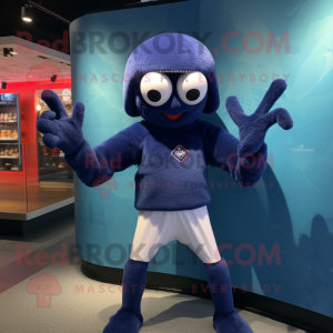 Navy Spider mascot costume character dressed with a Long Sleeve Tee and Beanies