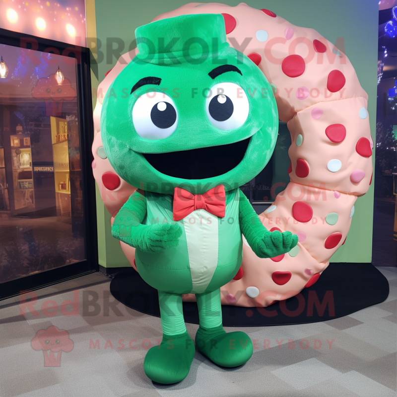 Green Donut mascot costume character dressed with a Turtleneck and Bow ties Green Donut mascot costume character dressed with a Turtleneck and Bow ties