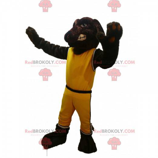 Brun hundmaskot med gul sportkläder - Redbrokoly.com