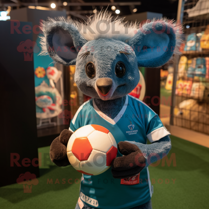 Teal Aye-Aye mascot costume character dressed with a Rugby Shirt and Suspenders