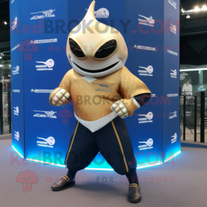 Gold Manta Ray mascot costume character dressed with a Rugby Shirt and Bracelet watches