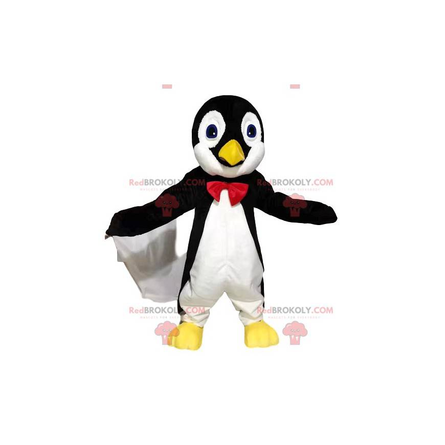 Mascote pinguim preto e branco com gravata borboleta vermelha -