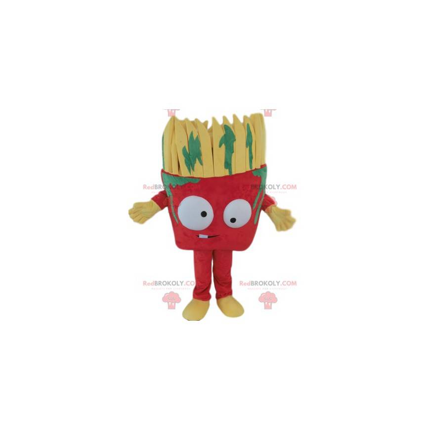 Mascota de pincel rojo con manchas de pintura verde -