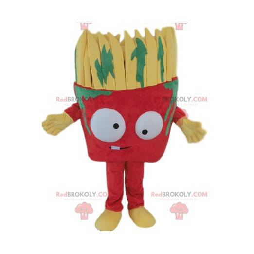 Mascote do pincel vermelho com manchas de tinta verde -