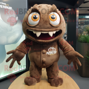 Brown Piranha mascot costume character dressed with a Long Sleeve Tee and Brooches