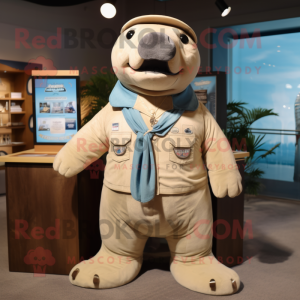 Beige Stellar'S Sea Cow mascot costume character dressed with a Denim Shorts and Bow ties