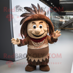 Brown Chief mascot costume character dressed with a Blouse and Wraps