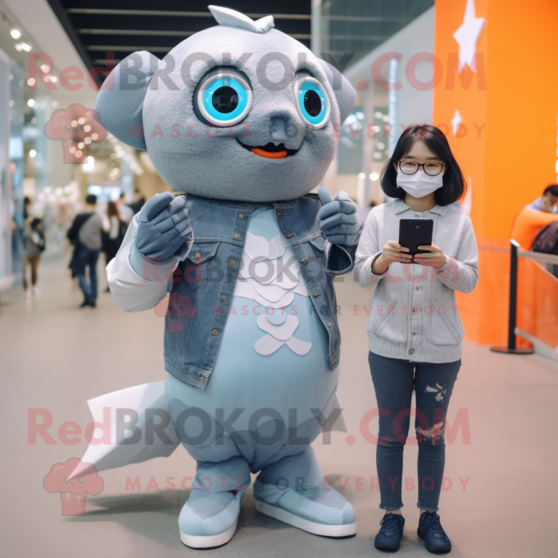 Gray Goldfish mascot costume character dressed with a Mom Jeans and Smartwatches