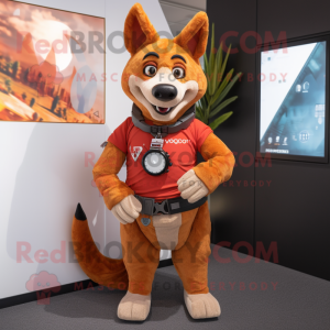 Rust Dingo mascot costume character dressed with a Graphic Tee and Smartwatches