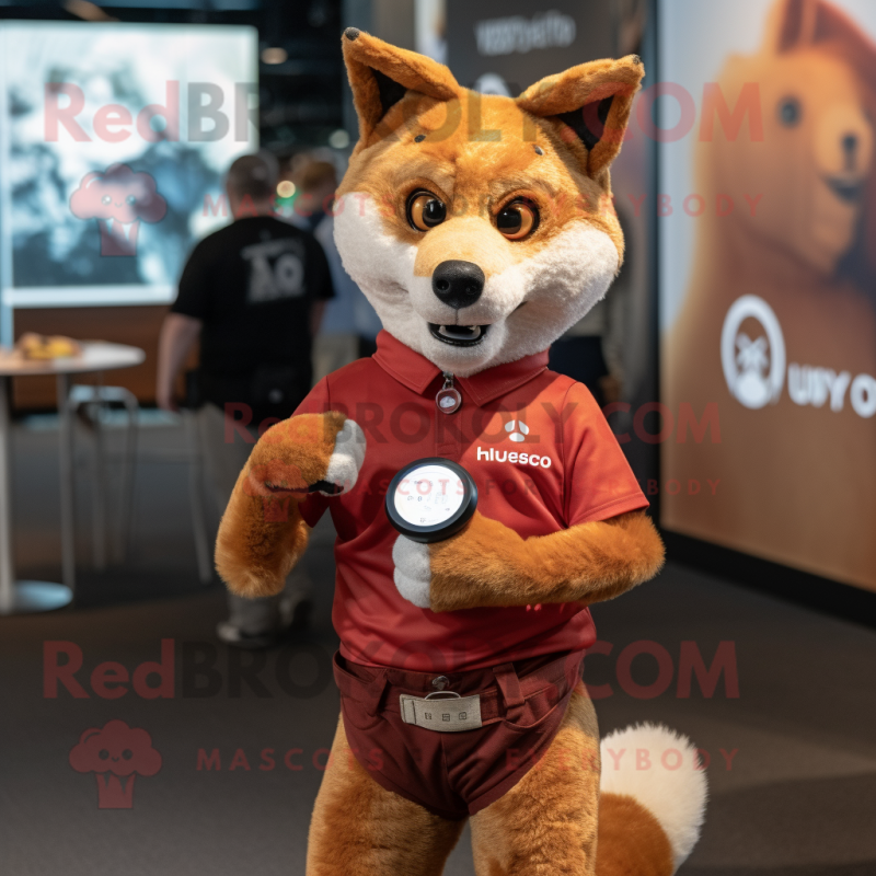 Rust Dingo mascot costume character dressed with a Graphic Tee and Smartwatches Rust Dingo mascot costume character dressed with a Graphic Tee and Smartwatches