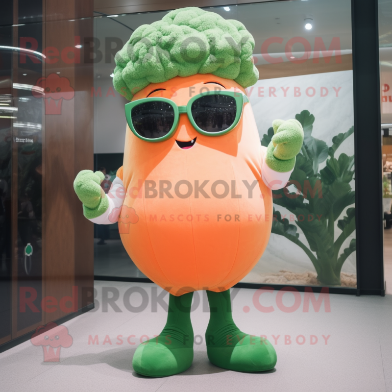 Peach Broccoli mascot costume character dressed with a Long Sleeve Tee and Sunglasses