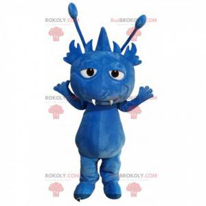 Mascotte de petit monstre bleu avec des antennes -