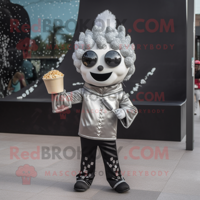 Silver Pop Corn mascot costume character dressed with a Leather Jacket and Hairpins