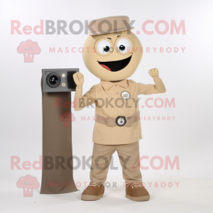 Tan Camera mascot costume character dressed with a V-Neck Tee and Shoe clips