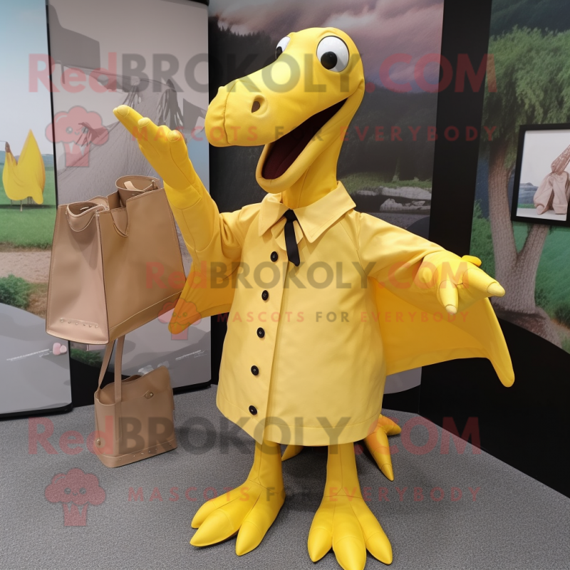 Yellow Pterodactyl mascot costume character dressed with a Raincoat and Clutch bags Yellow Pterodactyl mascot costume character dressed with a Raincoat and Clutch bags